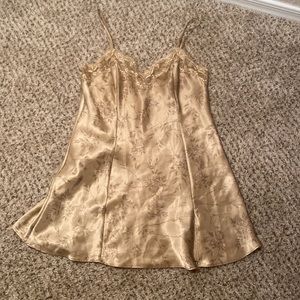Never worn Victoria’s Secret gold slip dress, size extra small, also fits small